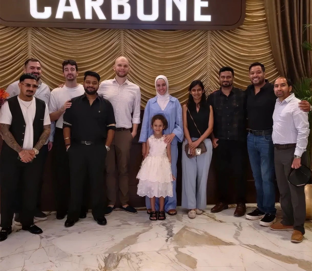 The Stratus Carta team together at a company dinner